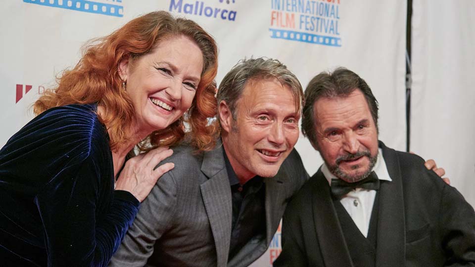 a group of people posing for the camera